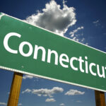 Road sign with Connecticut written on it